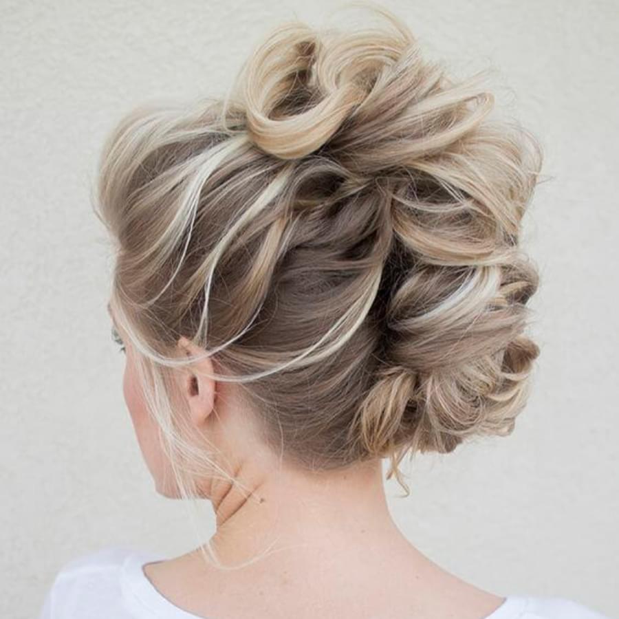 Top 10 Elegant Hairstyles Every Woman Should Try for 2024